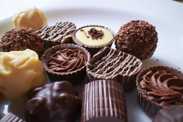 Süßigkeiten auf hölzerner Serviette — Stockfoto