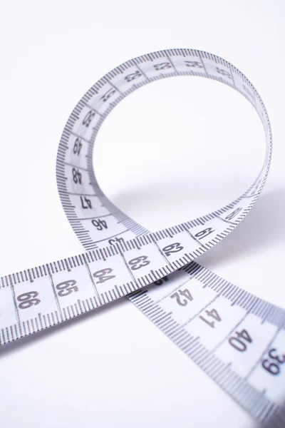 Measure tape on white Royalty Free Stock Images