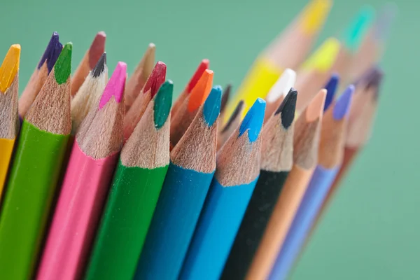 Color pencils on green — Stock Photo, Image