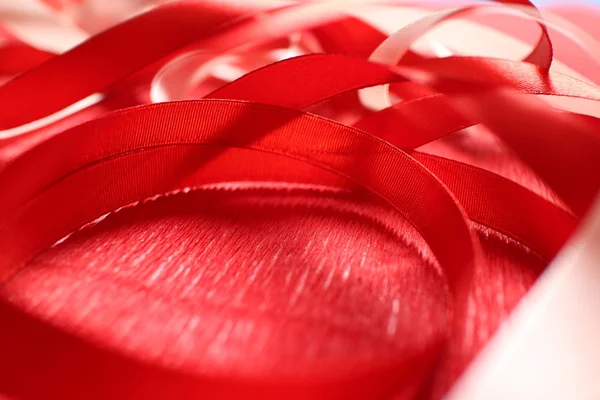 Ribbons on the red background — Stock Photo, Image