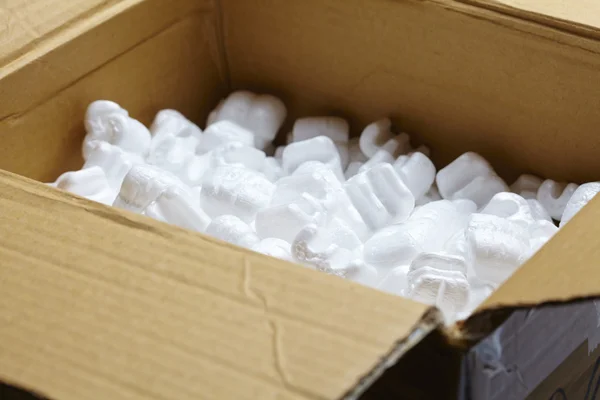 Box with white packaging filling — Stock Photo, Image