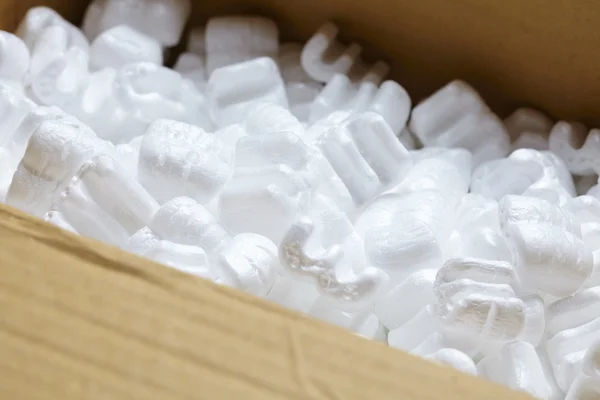 Box with white packaging filling — Stock Photo, Image