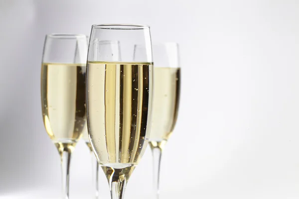 Champagne glasses on white — Stock Photo, Image