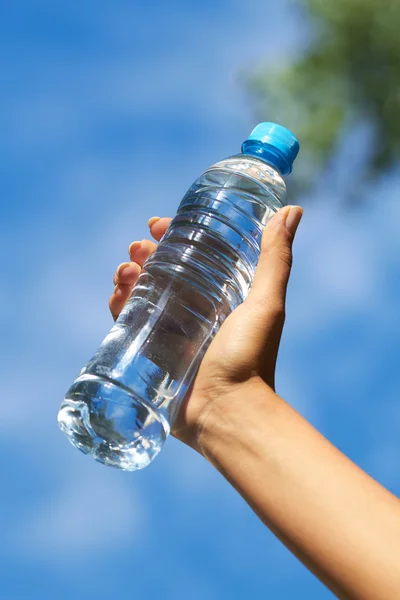 Woman with bottle of water — Stock Photo, Image