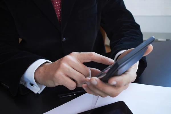 Businessman using calculator — Stock Photo, Image