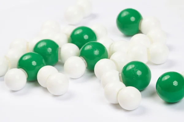 Palle di plastica su bianco — Foto Stock