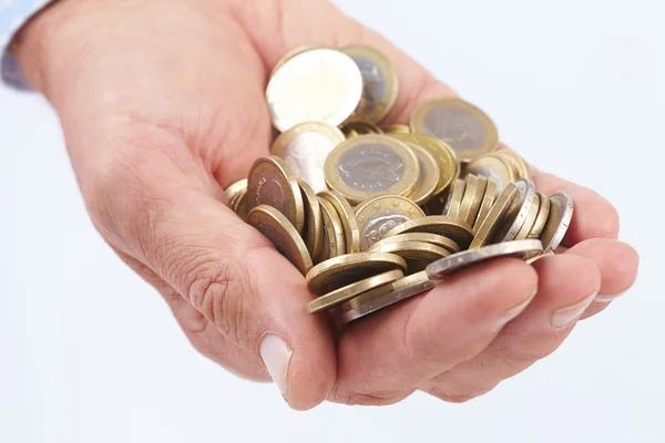 Euro coins in palm — Stock Photo, Image