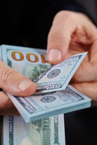 Businessman holding banknotes
