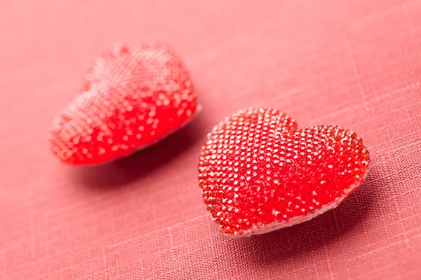 Red hearts on red — Stock Photo, Image