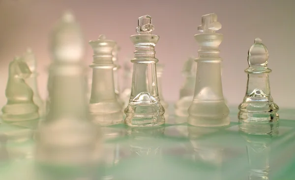 Glass chess figurines — Stock Photo, Image