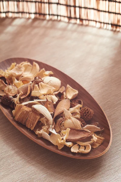 Dry plants in plate — Stock Photo, Image