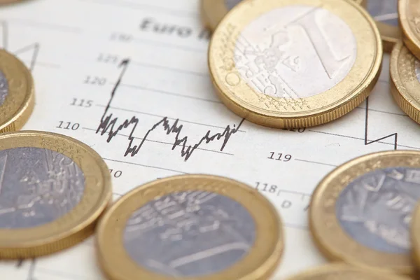 Euro coins on graph — Stock Photo, Image