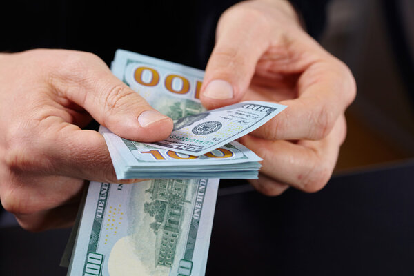 Businessman holding banknotes