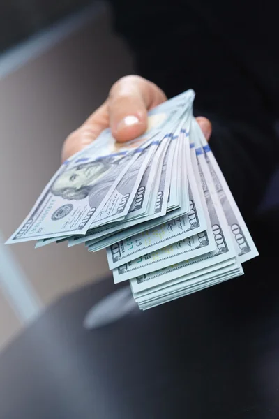 Businessman holding banknotes — Stock Photo, Image