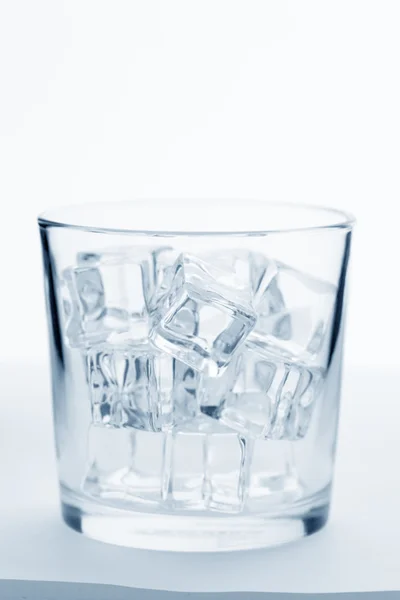 Glass with ice cubes — Stock Photo, Image