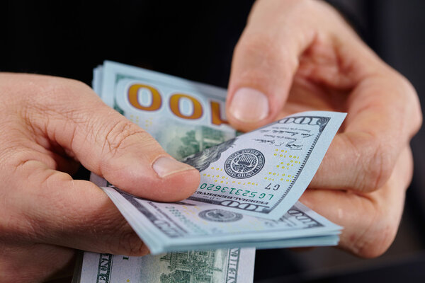 Businessman holding banknotes