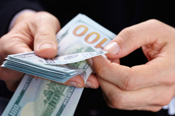 Businessman holding banknotes