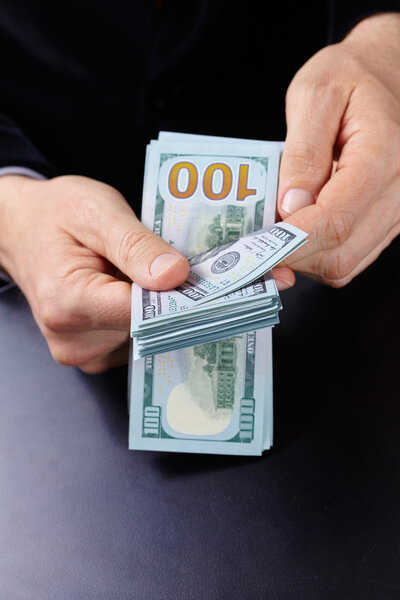 Businessman holding banknotes