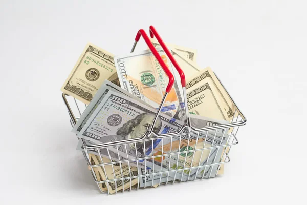 Shopping cart and dollars — Stock Photo, Image