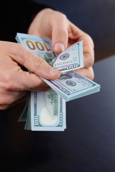 Businessman holding banknotes