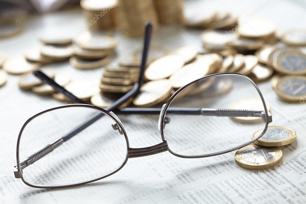 composition with glasses and coins