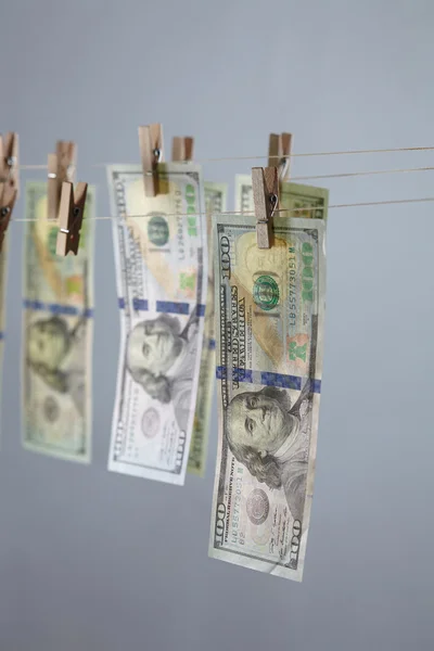 Clothespins com conceito de dólares — Fotografia de Stock