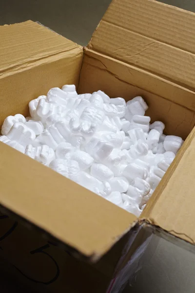 Box with white packaging filling — Stock Photo, Image