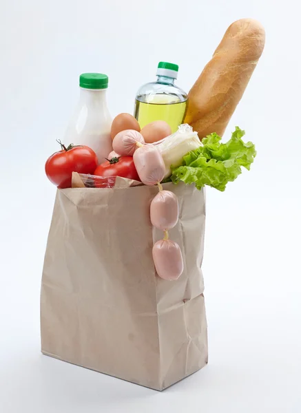 Food in bag on white — Stock Photo, Image