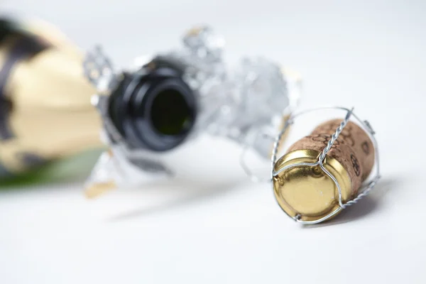 Bottle of champagne and cork — Stock Photo, Image