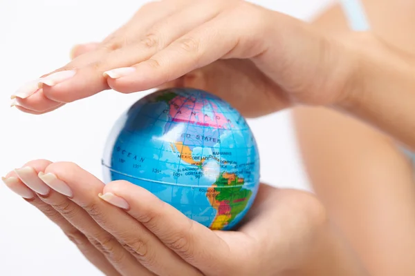 Woman's hands with globe — Stock Photo, Image