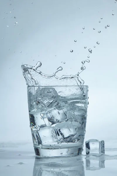 Ice cubes in water — Stock Photo, Image