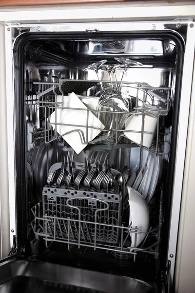 Open dishwasher with clean utensils — Stock Photo, Image