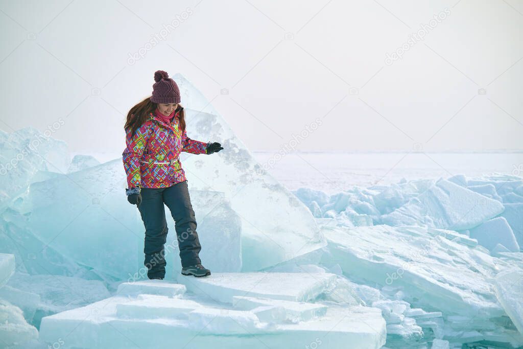 Traveller in a ski suit in Surreal Ice Landscape, Kazakhstan