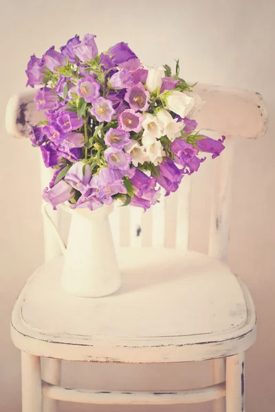 Vintage flowers background with campanula bouquet. — Stock Photo, Image