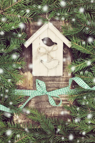 Christmas composition with small bird house. — Stock Photo, Image