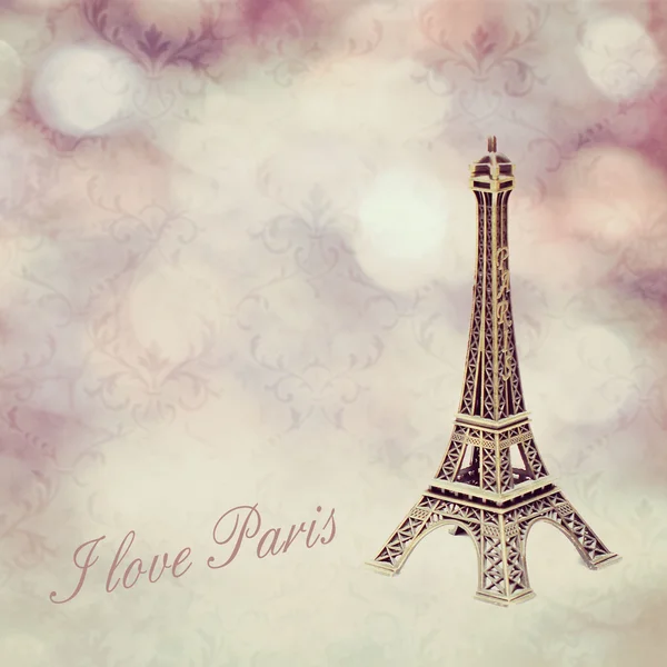 Vintage pink background and Eiffel tower — Stock Photo, Image