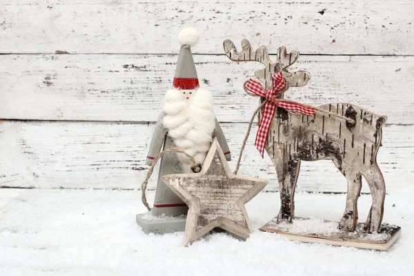 Christmas Reindeer on wooden background in scandinavian style — Stock Photo, Image