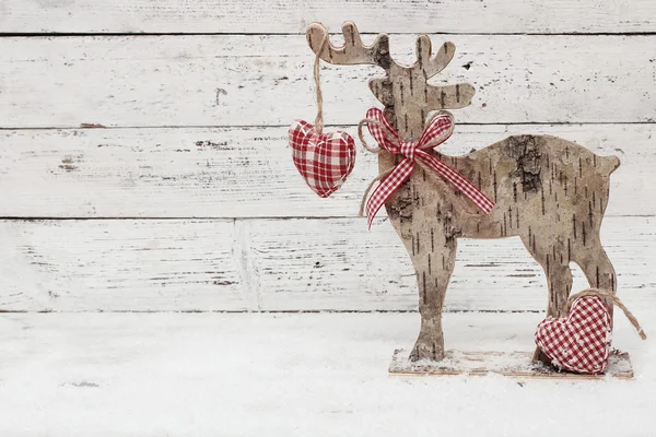 Renne de Noël sur fond en bois dans un style scandinave — Photo