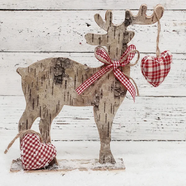 Рождественский олень на деревянном фоне в скандинавском стиле — стоковое фото
