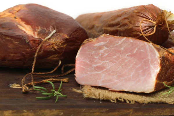 Ham on wooden table — Stock Photo, Image