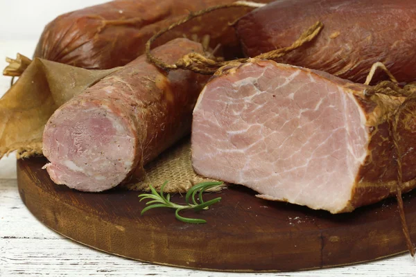 Ham on wooden table — Stock Photo, Image