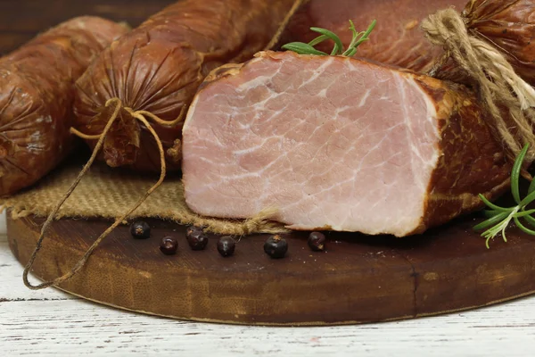 Ham on wooden table — Stock Photo, Image
