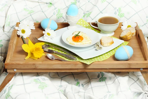 Tray with breakfast on a bed — Stock Photo, Image