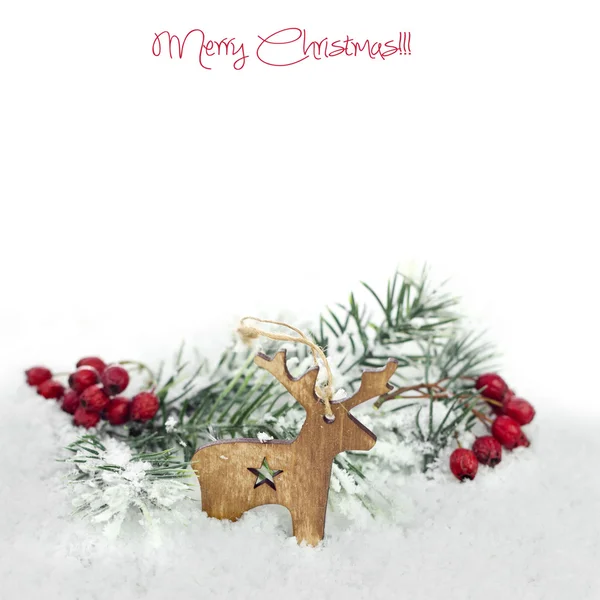 Christmas background with wooden reindeer — Stock Photo, Image