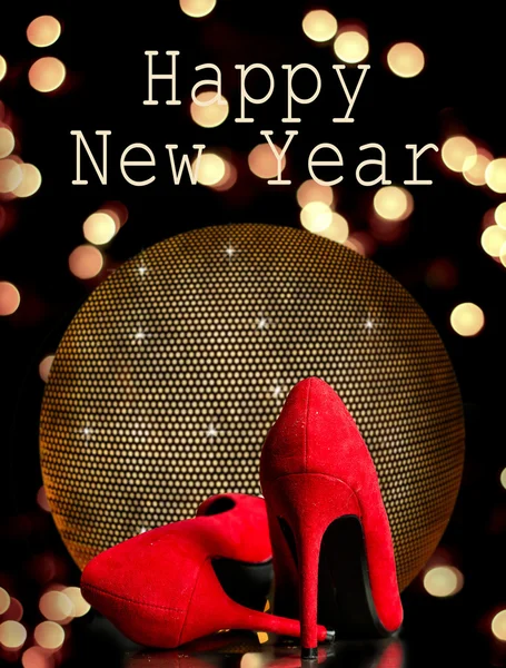 Red party shoes and text Happy New Year — Stock Photo, Image