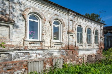 An old brick apartment building in the city of Mariinsk, Kemerovo region-Kuzbass
