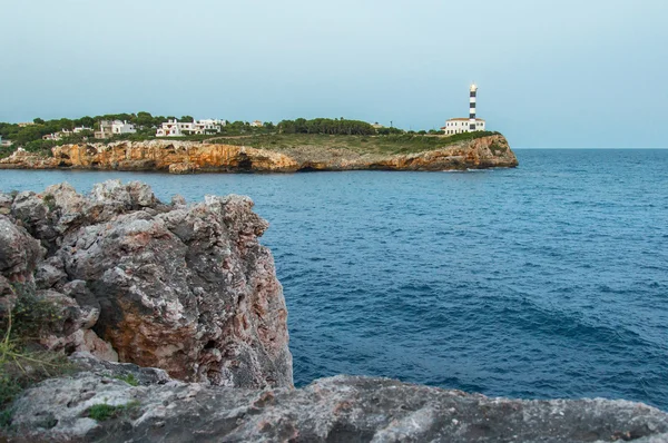Seacoast with lighthouse — Stock Photo, Image