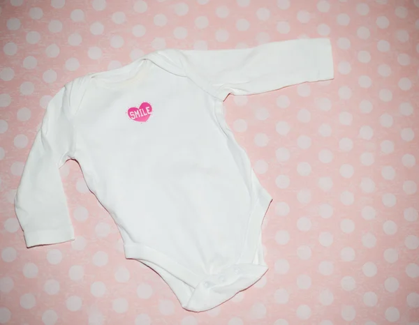 Bodysuit em fundo rosa — Fotografia de Stock