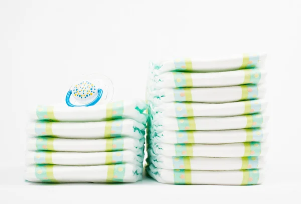 Diapers with pacifier isolated — Stock Photo, Image