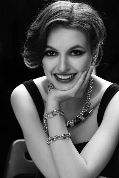 Close-up portrait of a stunning female model in evening dress and elegant posing over background. Beauty, fashion, optics. — Stock Photo, Image